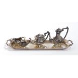 A miniature five piece silver tea and coffee set, of semi fluted form, comprising coffee pot, tea
