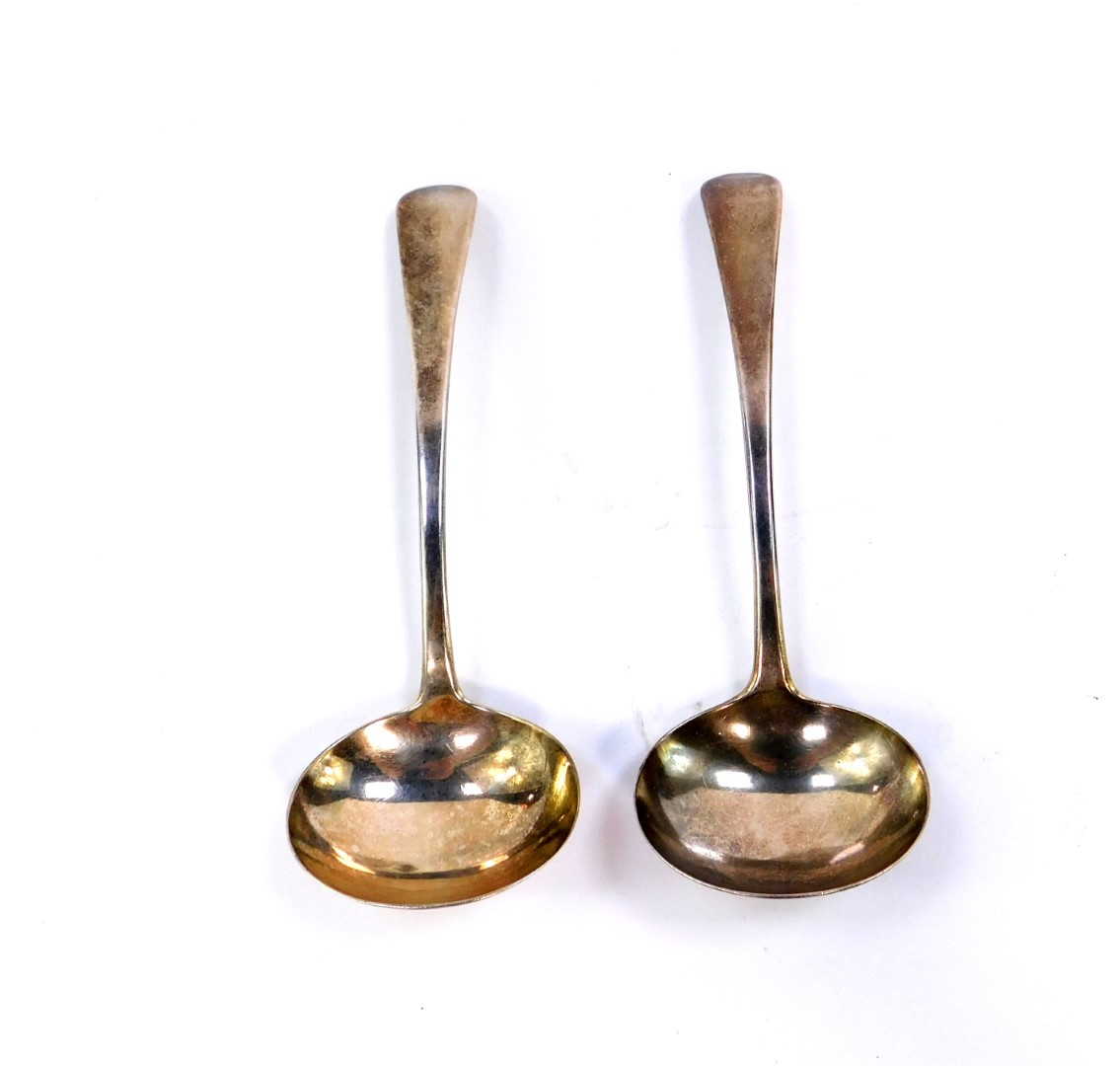 A pair of George III silver cream ladles, Robert Rutland, London 1811, 3.03oz.