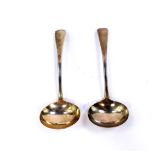 A pair of George III silver cream ladles, Robert Rutland, London 1811, 3.03oz.