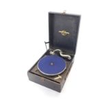 A Columbia table top gramophone, black cased, 15cm H, 29.5cm W, 38cm D.