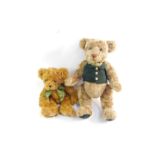 Two Harrods Teddy Bears, one wearing a green waistcoat and cravat, 51cm and 32cm H respectively.