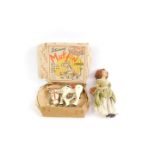 A Muffin The Mule Junior, boxed, together with a cloth doll modelled as Nell Gwynn, holding a basket