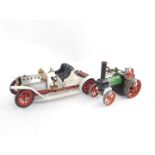 A Mamod White Steam Roadster, and a steam tractor, both unboxed. (2)
