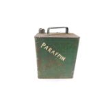 A petrol can, green painted, 33cm H.
