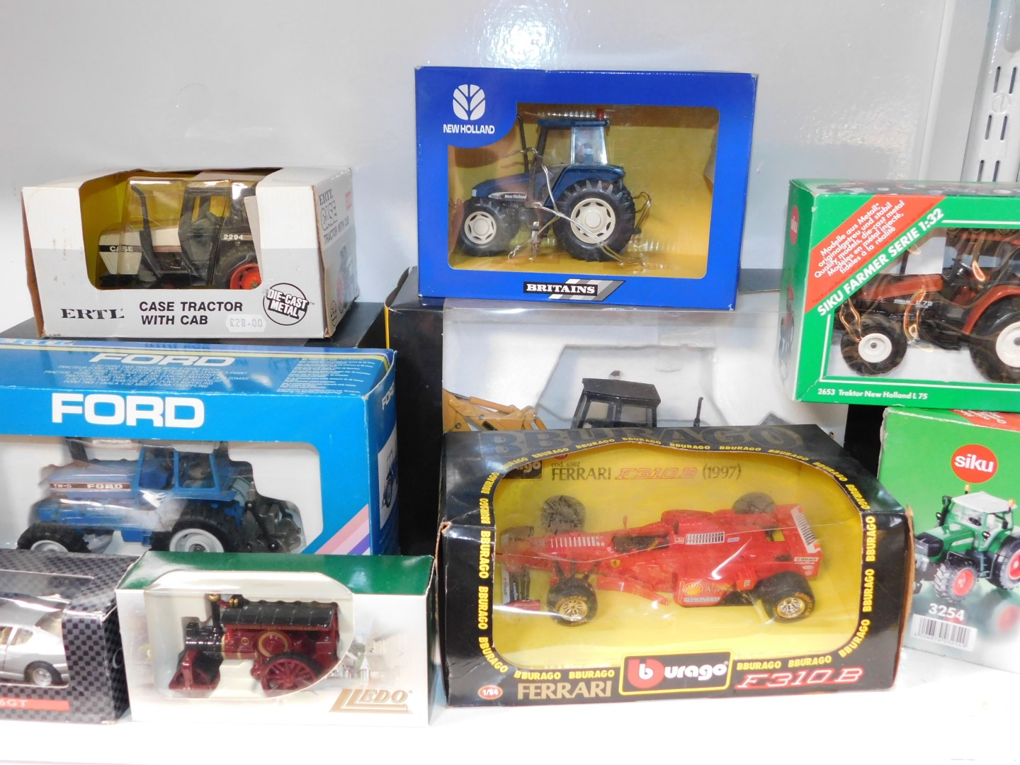 Britains ERTL and other die cast models of tractors, Burago Ferrari F310B, and other die cast