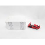 A Franklin Mint die cast model of a red Jaguar E type, scale 1:24, boxed.