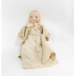 An Armand Marseille bisque head doll, with a composite body, 38cm H.