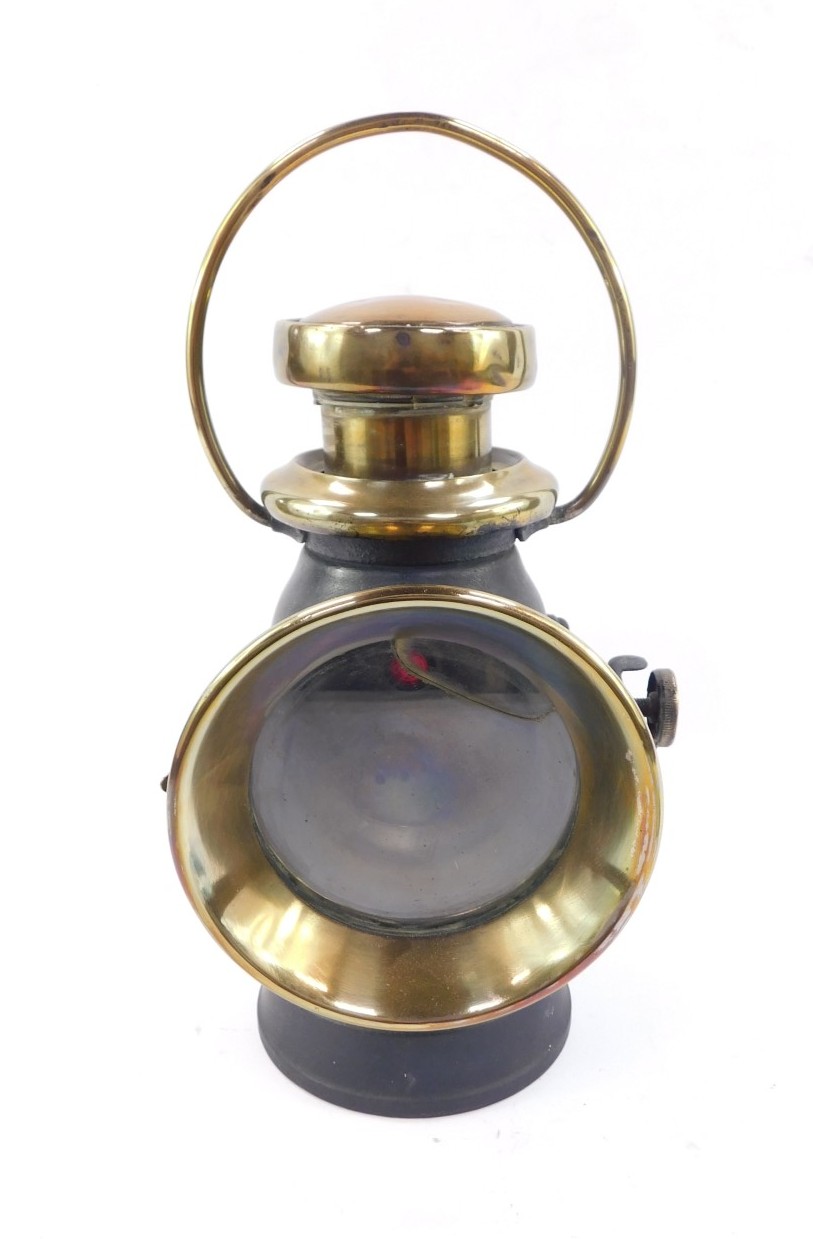 A brass and black painted Lucas 'King Of The Road' side lamp, No 726, with brass loop handle, 26.5cm