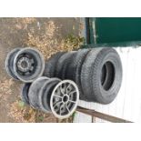 A set of four Dunlop 500C X10 10" wheels, together with four Dunlop Racing 5.00 L-10 tyres, off a