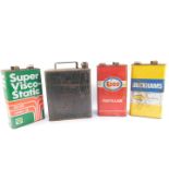 Three vintage oil cans, comprising BP, Esso, Duckhams, together with a Shell petrol can. (4)