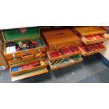 A significant collection of Meccano, in four bespoke chests and boxes, together with Meccano