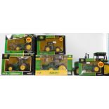 Four ERTL die cast models of tractors, comprising John Deere 7820 42140, John Deere 8330 Tractor