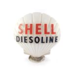 A Shell Diesoline glass petrol pump globe, with red and black lettering in relief, stamp to base