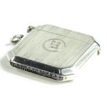 A George V silver Vesta case, with engraved with stripes and central cartouche engraved with