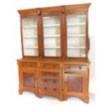 A 19thC North Country oak and mahogany dresser, the raised back with three glazed doors, the
