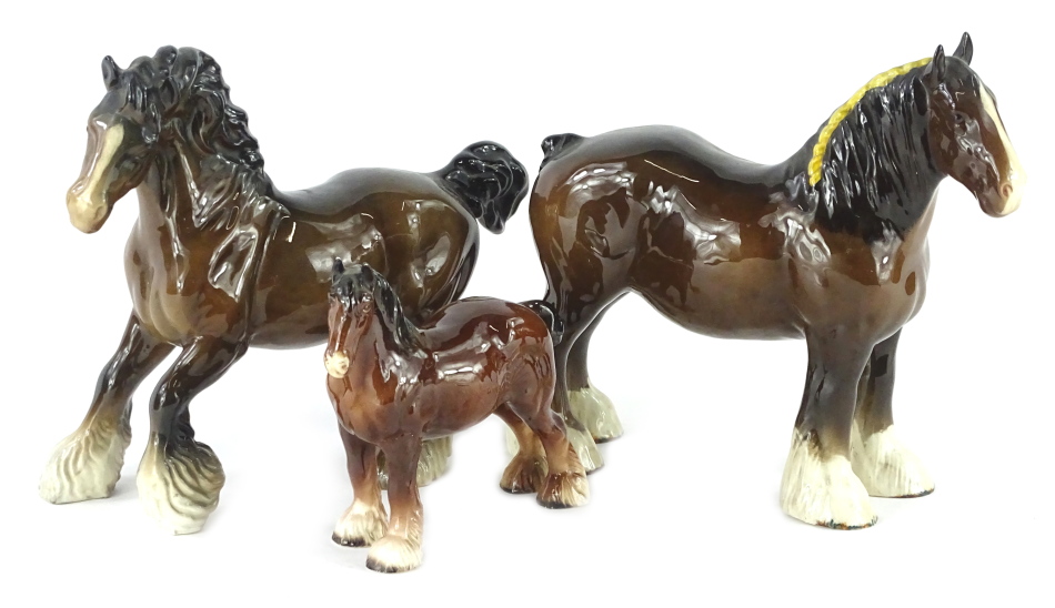 Three Beswick brown shires, to include a foal.