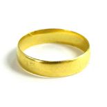 A 22ct gold wedding band, of plain design, with maker's stamp S.B.?, ring size R½, 3.9g all in.