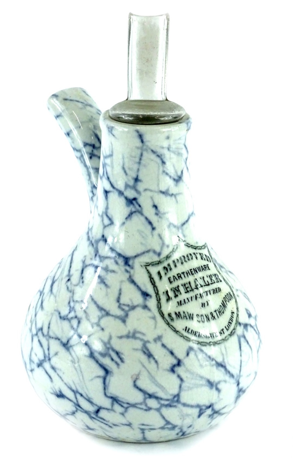 A S. Mawson & Thompson improved pottery inhaler, with marbled decoration and glass mount, 27cm H