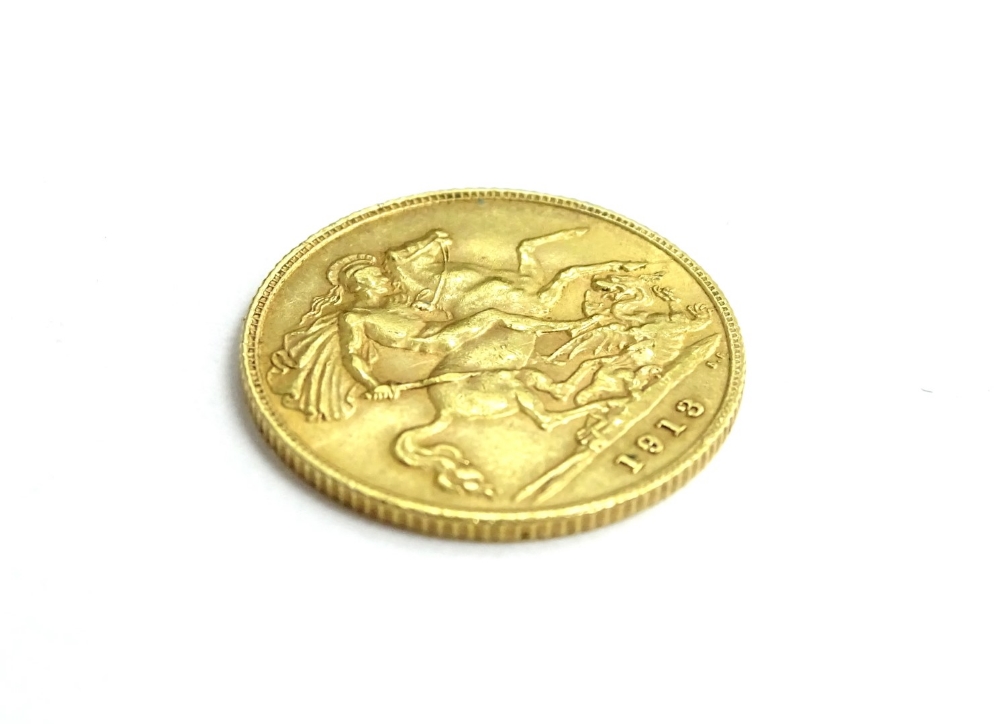 A George V half gold sovereign, dated 1913.