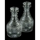 A pair of early 19thC cut glass decanters and stoppers, 20cm H.