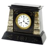 A late 19thC French black marble and slate mantel clock, of tapering form with a white enamel