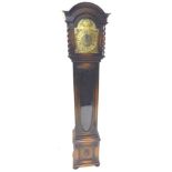 A grandmother clock in oak case, the arched brass dial signed Tempus Fugit above a single door