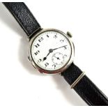 A vintage gent's silver wristwatch, with white enamel dial, black numbering, blue hands, seconds