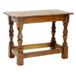 A rectangular oak occasional table by Wilf Squirrelman Hutchinson, on baluster shaped faceted