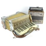 A Hohner small piano accordion and another bearing name Lombardi (AF).