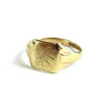 A 9ct gold signet ring, with rectangular ring head, with sunburst type decoration, ring size V, 4.