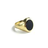 A 9ct gold signet ring, with maker's stamp JH, ring size K, set with black agate stone, 4.8g all