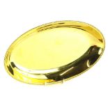 A WMF gold plated oval dish, with gadrooned border, plated in 24 carat gold.