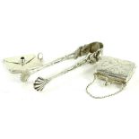A collection of small silver, to include sugar tongs, a Continental silver pill box modelled in