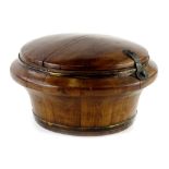 An oriental hardwood food container, of barrel form with brass coopering, 33cm W.