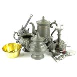 A large quantity of 19thC and later pewter, to include a large hot water jug, a pair of