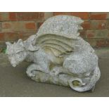 A reconstituted stone dragon or gargoyle, 51cm L.
