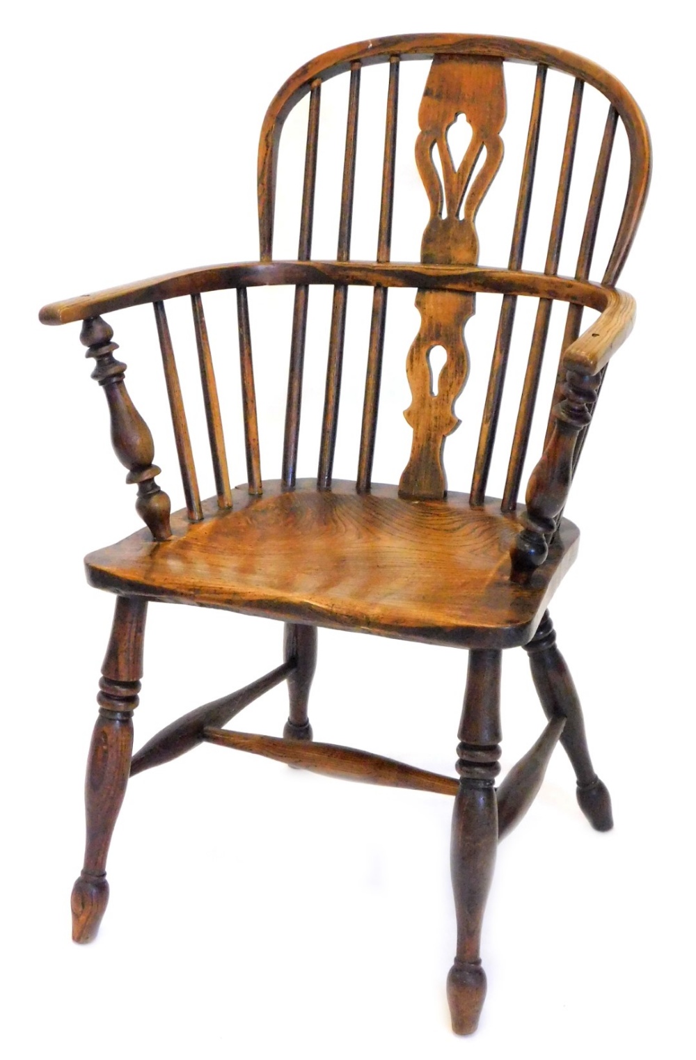 A 19thC ash and elm Windsor chair, with a pierced splat, solid seat, on turned tapering legs with
