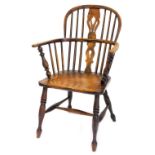 A 19thC ash and elm Windsor chair, with a pierced splat, solid seat, on turned tapering legs with