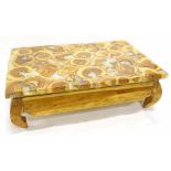 An unusual bespoke coffee table, the rectangular top made from sliced wooden timber oysters,