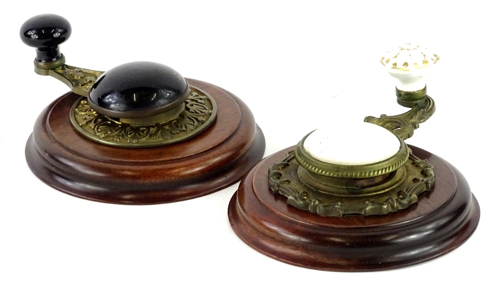 Two Victorian servants bell pulls, each with porcelain or enamel decoration, later mounted.