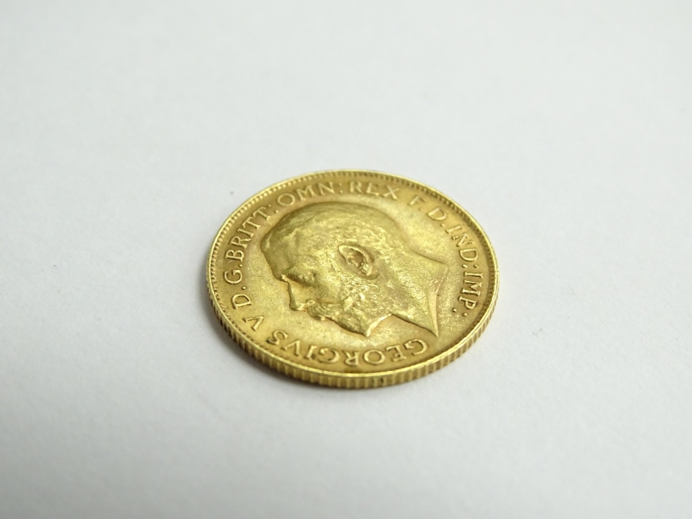 A George V half gold sovereign, dated 1913. - Image 2 of 2