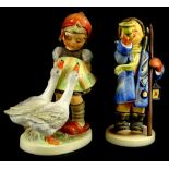 Two large Goebel Hummel figurines, one modelled in the form of a lady with geese, limited edition