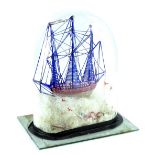 A late Victorian/early 20thC spun glass model of a ship, in glass dome, lacking stand, 37cm H.