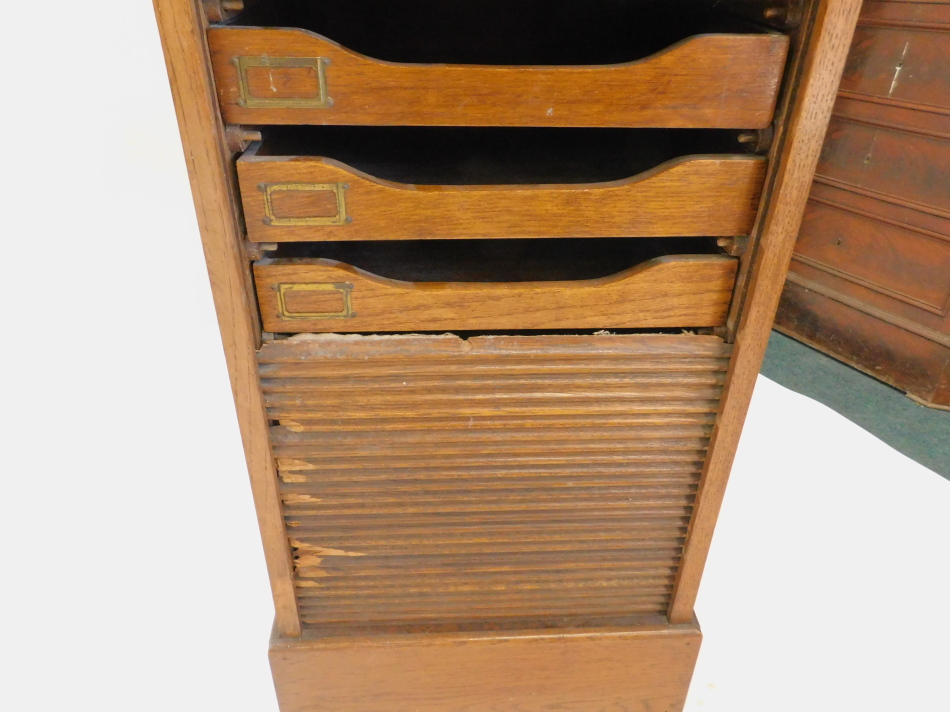 An early to mid 20thC oak filing cabinet, the rectangular top with a rising reading slope, above a - Image 2 of 2