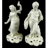 A pair of 19thC Stevenson and Hancock Derby porcelain figurines, each modelled as a young man