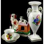 A Dresden porcelain two handled vase, painted with flowers in the Meissen style, a similar cabinet