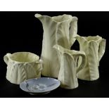 A collection of ceramics, to include three Royal Worcester leaf moulded jugs, a similar milk jug