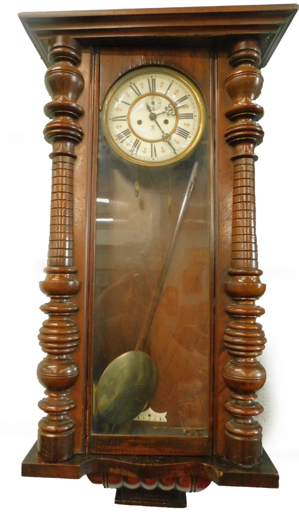 A Gustav Becker Vienna wall clock, with enamel type dial and turned pilasters, lacking crest etc.,