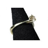 An 18ct white gold diamond solitaire ring, with round brilliant cut stone approx 30 points, in