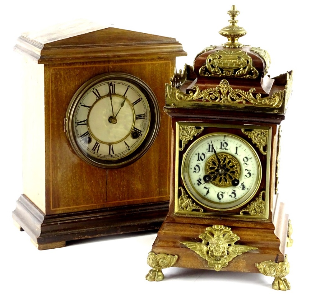 A Continental mahogany case mantel clock, with gilt brass mounts, the enamel dial with Arabic